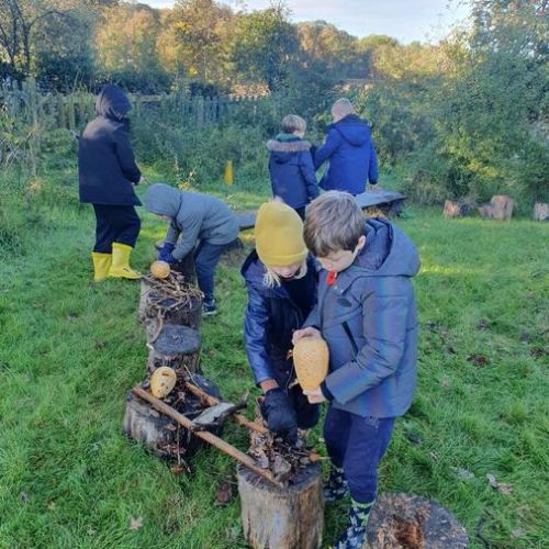 Using palm drills to create crazy creatures from ornamental gourds donated by Knebworth House.