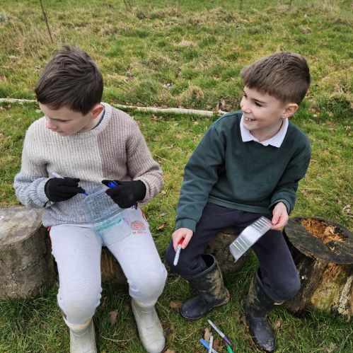 Making our own planters from 'rubbish' to grow cress in.